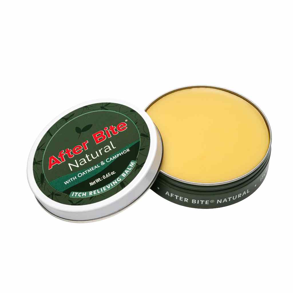 After Bite Natural with oatmeal and camphor itch relieving balm tin opened showing yellow balm contents