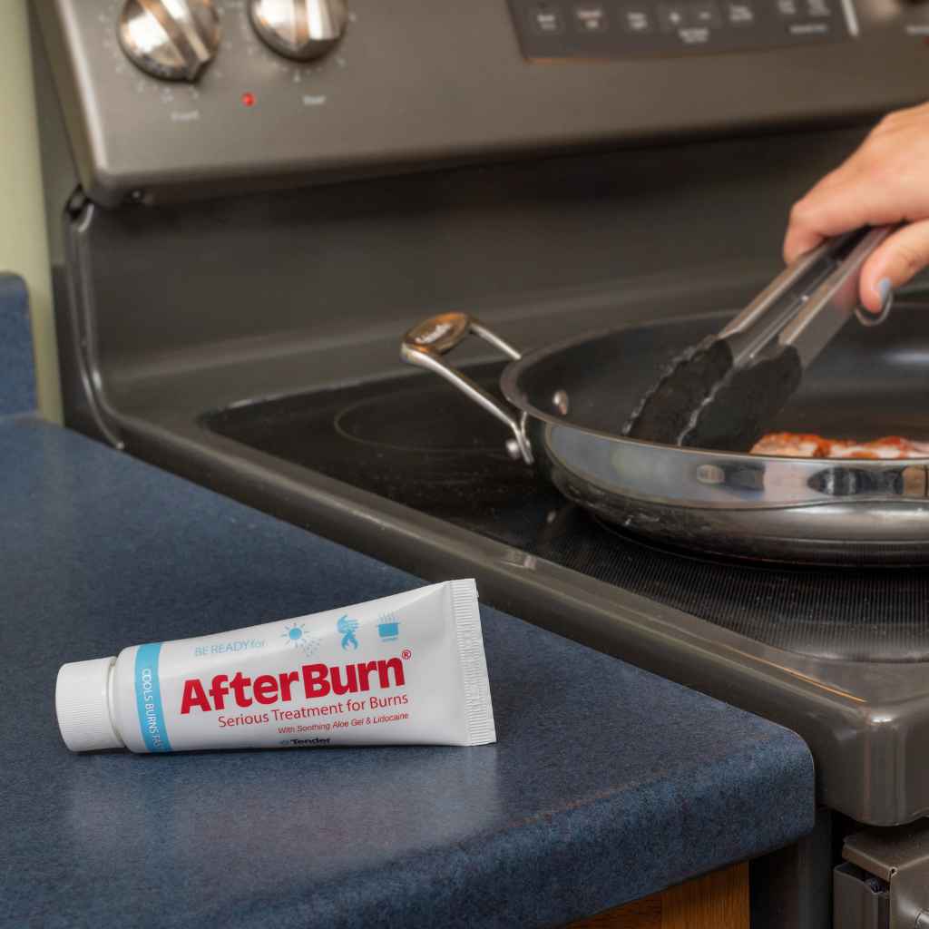 AfterBurn Gel on counter next to stove with person cooking